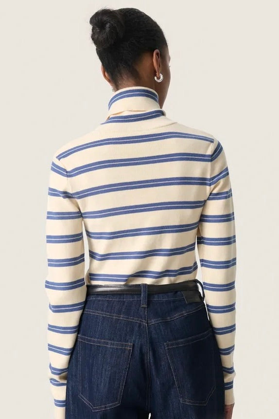 Soaked in Luxury: Spina Turtleneck