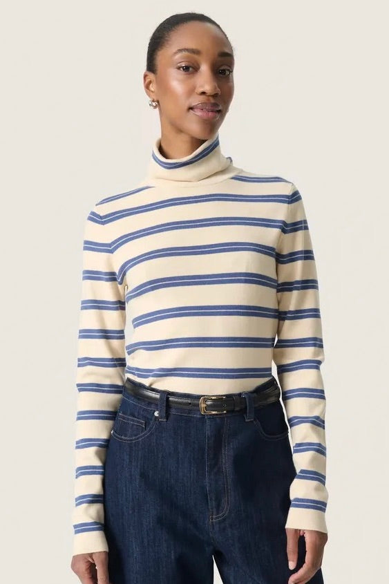 Soaked in Luxury: Spina Turtleneck