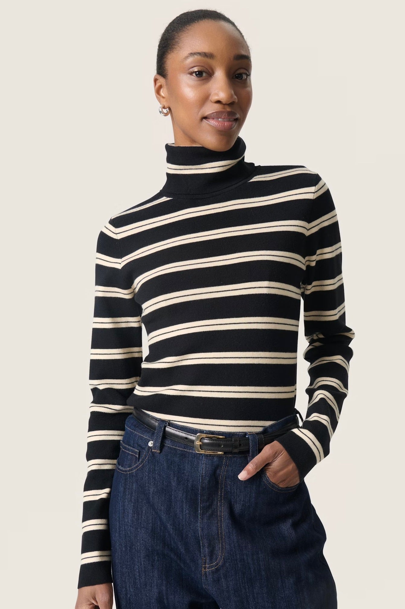 Soaked in Luxury: Spina Turtleneck