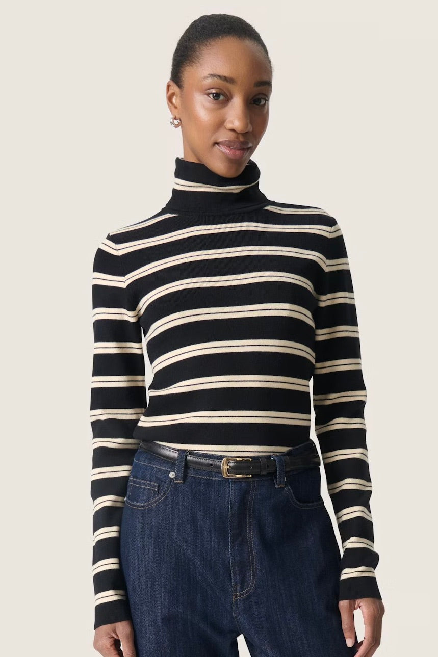 Soaked in Luxury: Spina Turtleneck