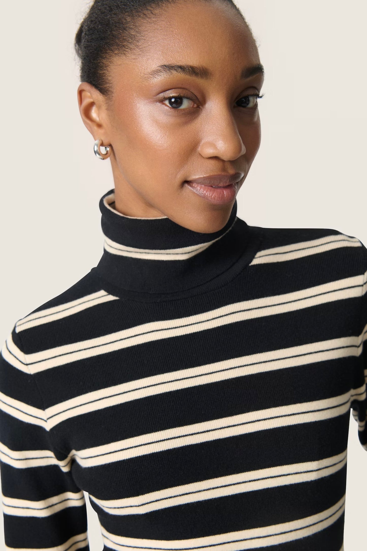 Soaked in Luxury: Spina Turtleneck